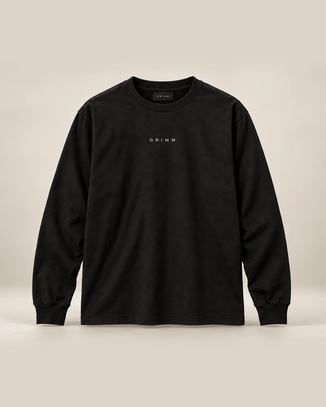 Black long-sleeve tee with a small GRIMM wordmark on the chest.